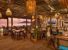 Immerse yourself in the allure of Goa's beach resort restaurant, where delectable flavour's and coastal ambiance create an unforgettable dining experience.